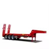 Zware halve aanhangwagen met laag bed voor het veilig vervoeren van machines en bouwvoertuigen met overgrote apparatuur